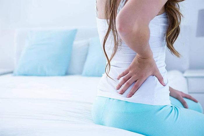 Bầu 3 tháng đầu bị đau lưng là hiện tượng phổ biến và dễ gặp phải.